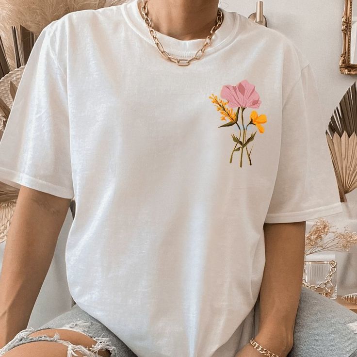 Watercolor Flower T Shirt. White Short Sleeve Tee. Custom Handmade To Order. For An Oversized Graphic Tee Please Size Up! Thank You For Considering To Purchase From A Female Small Business Owner! White Crew Neck T-shirt With Floral Applique, White Relaxed Fit T-shirt With Watercolor Print, White Watercolor Print Short Sleeve T-shirt, White Watercolor Print T-shirt For Spring, White Watercolor Print Short Sleeve Top, White Short Sleeve T-shirt With Floral Applique, White Short Sleeve Top With Floral Applique, Casual White T-shirt With Watercolor Print, White Floral Applique Short Sleeve Top