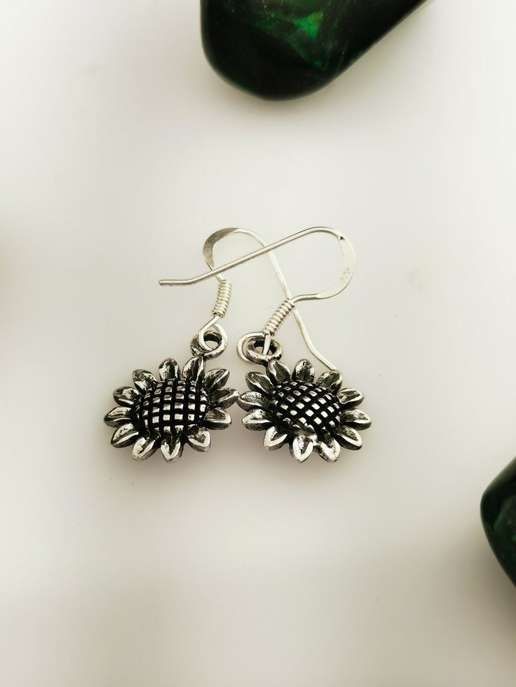 Sterling silver dangle sunflower earrings. Check out all of my matching sunflower pieces!\n Silver Flower Earrings For Summer, Silver Jewelry With Sunflower Design, Adjustable Sunflower Design Dangle Jewelry, Adjustable Sunflower Dangle Jewelry, Sunflower Design Dangle Earrings As Gift, Sunflower Design Dangle Earrings For Gift, Summer Gift Jewelry With Sunflower Design, Summer Sunflower Design Jewelry, Sunflower Dangle Earrings For Summer