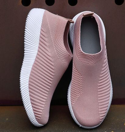 This mesh slip-on sneaker brings you the best of both worlds - comfort and style. Featuring a thick rubber sole and lovely lined pattern. Pair with your favorite jeans, joggers or shorts. Comes in eight fabulous colors from which to choose. Cheap Womens Shoes, Spring Sneakers, Sneakers Looks, Slip On Flats, Summer Sneakers, Sport Shoes Women, Spring Shoes, Platform Sneakers, Casual Shoes Women