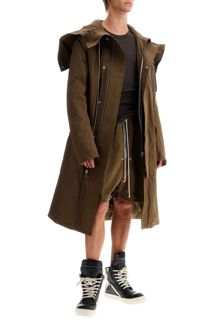 Find RICK OWENS Oversized Park on Editorialist. The Rock Owens parka is made of a cotton blend fabric and features oversized volumes and an oversized fit. It has a hidden zip closure with snap buttons, a drawstring hood, and a lightly padded and lined interior with two zip pockets. It also includes flap pockets and two patch pockets. The model is 187 cm tall and wears size IT 48. Oversized Khaki Parka For Streetwear, Oversized Khaki Cotton Parka, Oversized Cotton Parka Long Coat, Oversized Cotton Parka For Fall, Urban Oversized Parka With Pockets, Oversized Techwear Parka For Spring, Hooded Parka With Zip Cuffs For Winter, Cotton Parka With Detachable Hood, Oversized Spring Techwear Parka