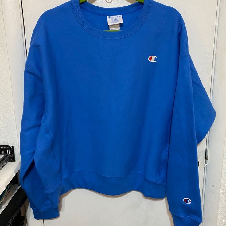 Blue Sweatshirt Nwt Blue T-shirt For Fall Streetwear, Blue Cotton T-shirt With Ribbed Cuffs, Oversized Blue T-shirt, Blue Long Sleeve College Sweatshirt, Blue Crew Neck T-shirt, Blue Cotton Sweatshirt For College, Casual Blue Sweatshirt For College, Blue College Sweater With Ribbed Cuffs, Blue Crew Neck Sweater For College