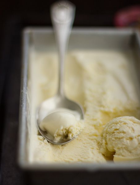 two scoops of ice cream in a metal pan