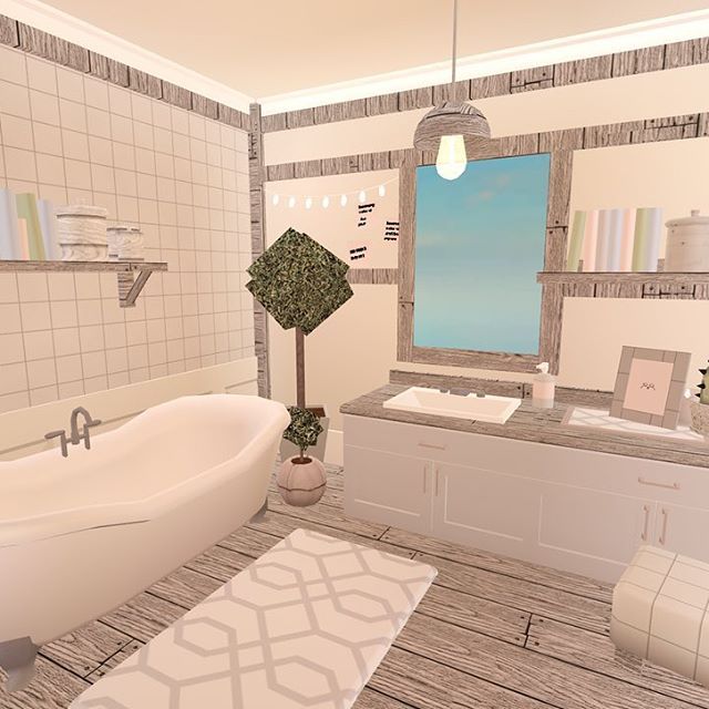 a bathroom with a bathtub, sink and toilet in it's own room