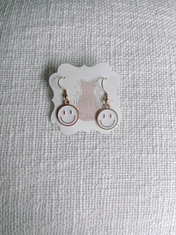 White Smiley Face Happy Smiles Earrings from Sassy Shortcake Boutique Smiley Face Earrings, Sassy Shortcake, Face Earrings, Smiley Faces, Yellow And Black, Happy Smile, Smiley Face, Christmas List, Smiley