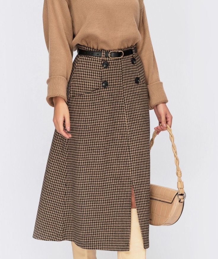 "Plaid jacquard midi-length skirt. Model with pockets, decorative buttons and front slit. Fastens with a hidden zipper. Fabric: 35% wool, 35% viscose, 30% polyester Skirts length 77 cm chest waist hip XS: 84cm 64cm 88cm (33\") (25\") (34.6\") S: 88cm 68cm 92cm (34.6\") (26.7\") (36.2\") M: 92cm 72cm 96cm (36.2\") (28.3\") (37.8\") L: 96cm 76cm 100cm (37.8\") (29.9\") (39.4\") XL: 100cm 80cm 104cm (39.4\") (31.5\") (40.9\") 2XL: 104cm 84cm 108cm (40.9\") (33.1\") (42.5\") 3XL: 108cm 88cm 112cm (4 Cute Winter Skirts, Elegant Long Skirt Outfits, Wool Skirt Outfit, Cozy Skirt, Warm Skirt, Warm Skirts, Office Clothing, Maxi Skirts Summer, Below The Knee Skirt