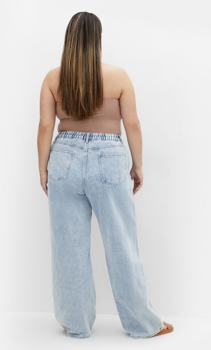 Bring your style up to speed with the Harley Kyla Wide Leg Jean. Designed with a high rise fit, inside leg seam detailing and made with stretch cotton blend fabrication, revel in the casual trendy look of these jeans.  Key Features Include:  - The perfect fit for an hourglass figure  - Belt looped semi elasticated waistband  - High rise  - Side pockets  - Single button and fly fastening  - Inside leg seam detailing  - High denim fibre retention to maintain shape  - Stretch Cotton blend fabrication  - Signature Chic Denim hardware throughout zips, buttons and rivets  - Wide leg  - Regular length  Team with a graphic tee for an effortless outfit. Effortless Outfit, Denim Chic, Light Wash Jeans, City Chic, Stretch Cotton, Plus Size Fashion, Leg Jeans, Graphic Tee, Wide Leg