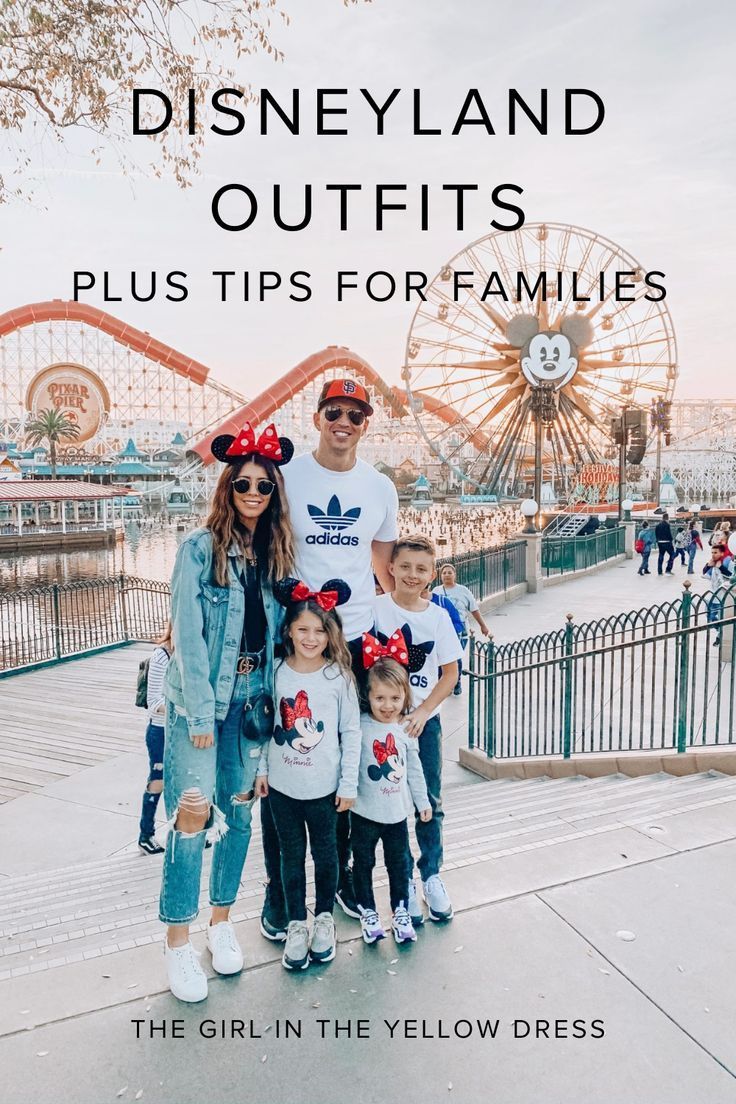 the family poses for a photo in front of disneyland's amusement park with text overlay that reads, disney land outfits plus tips for families