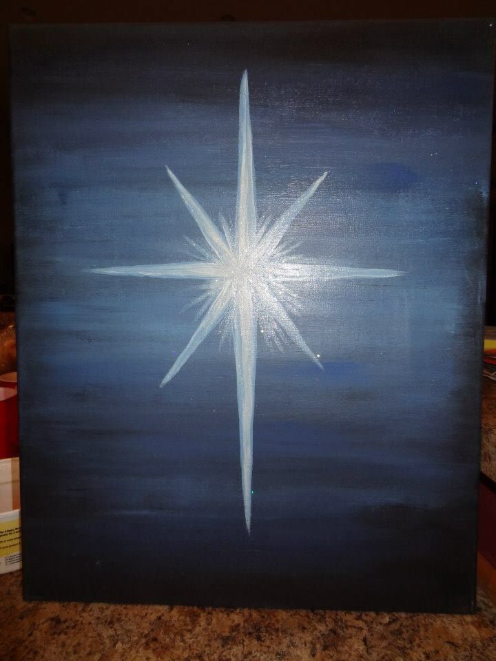 a painting of a white star on a blue background