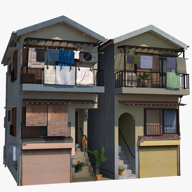 an apartment building with two balconies and three garages on the second floor