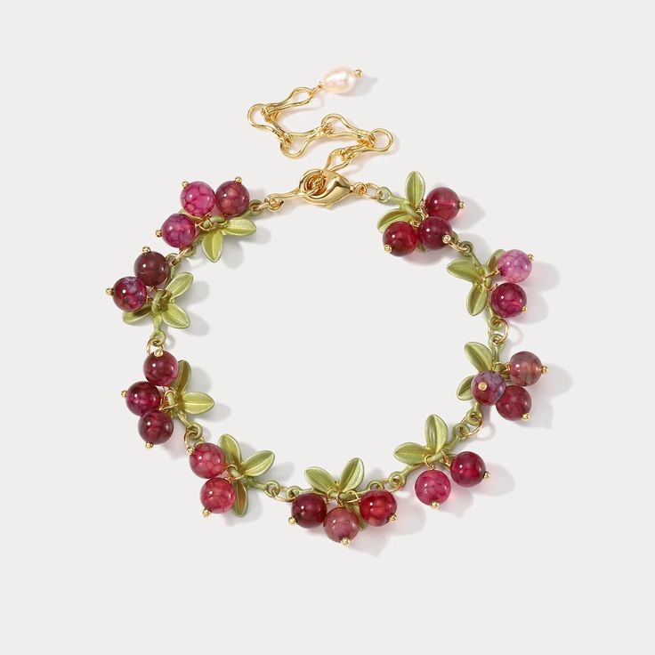 This Cranberry Agate Bracelet is the perfect accessory for the luxury-minded. From the stunning cranberry colour to the glossy agate stone, every element is carefully crafted for a sophisticated and exclusive look. Define your style with this timeless piece. DETAILS Plating: 18K Gold Materials: 18K Gold on Brass, Natur Fruit Bracelet, Funky Bracelet, Pomegranate Jewelry, Embroidered Bracelet, Define Your Style, Star And Moon Necklace, Diamond Evil Eye, Fruit Jewelry, Cuban Link Chain Necklaces