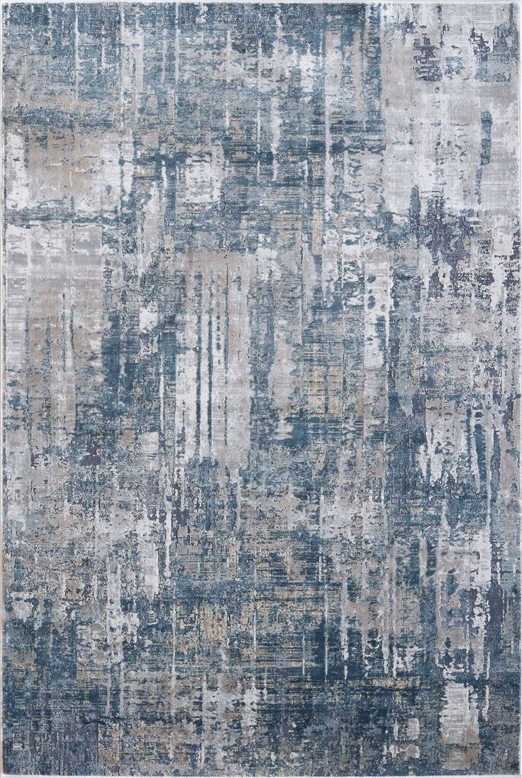 an abstract rug with blue and grey colors