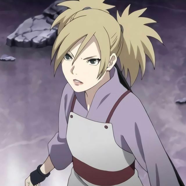 an anime character with blonde hair and blue eyes is standing in front of some rocks