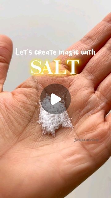 someone holding salt in their hand with the caption let's create magic with salt