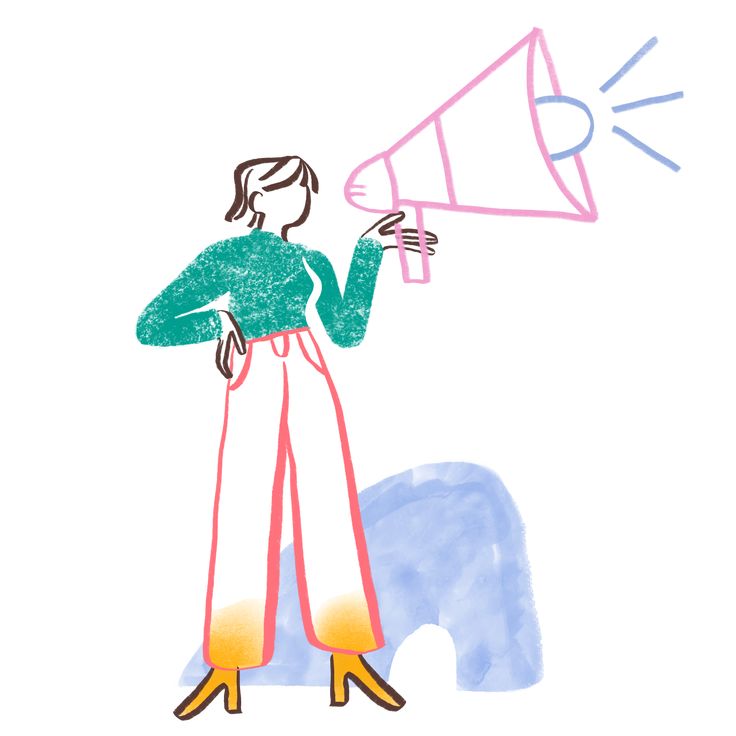 a woman holding a megaphone in her hand