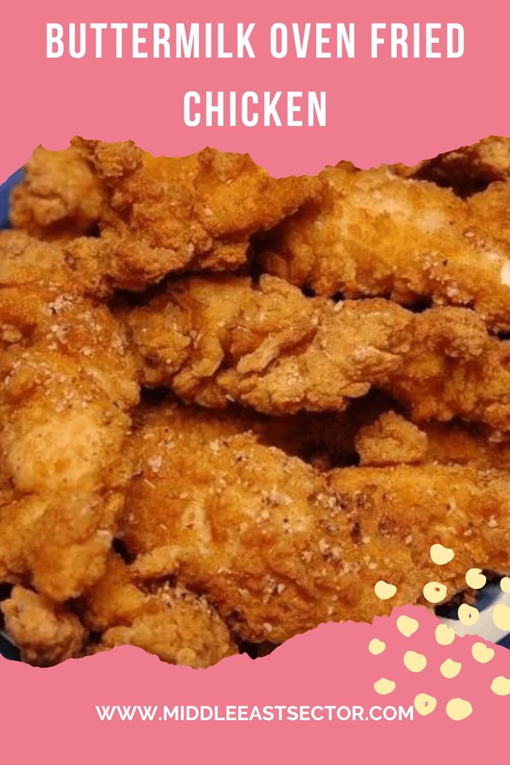 a blue plate topped with fried chicken on top of a pink and white tablecloth