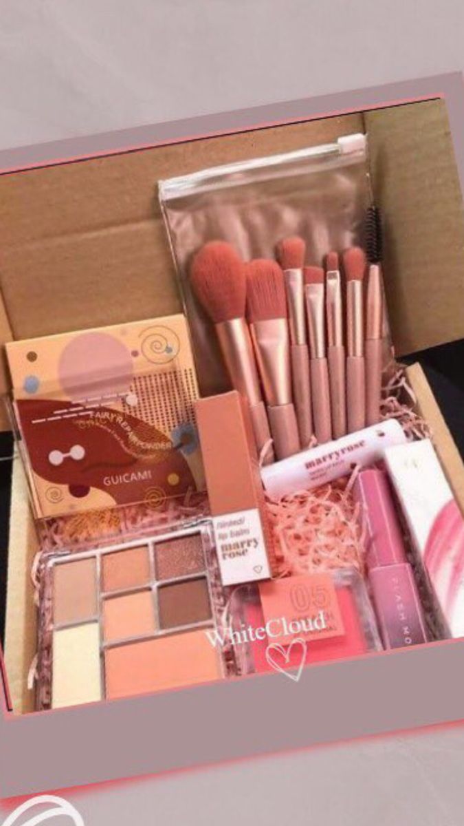 an open box filled with makeup and other items