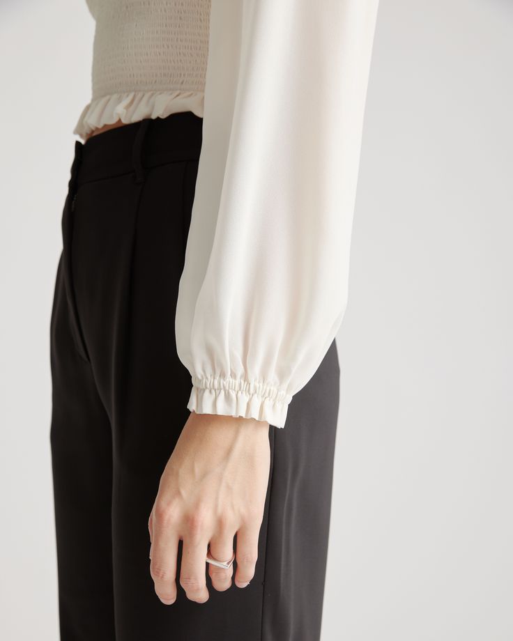 Luxe up any outfit with our ultra-wearable chiffon cropped blouse made from 100% recycled polyester. It’s the final touches that make this top stand out – with a smocked bodice and sheer sleeves in lightweight chiffon for next-level sophistication. Dress up a pair of jeans or skirt for a night on the town.  | Quince | Women's Chiffon Cropped Smocked Blouse in Ivory, Size XS, Recycled Polyester Smocked Blouse, Smock Blouse, Cropped Blouse, Comfy Chic, Chic Top, Crop Blouse, Chiffon Blouse, Cropped Cardigan, Sheer Sleeves