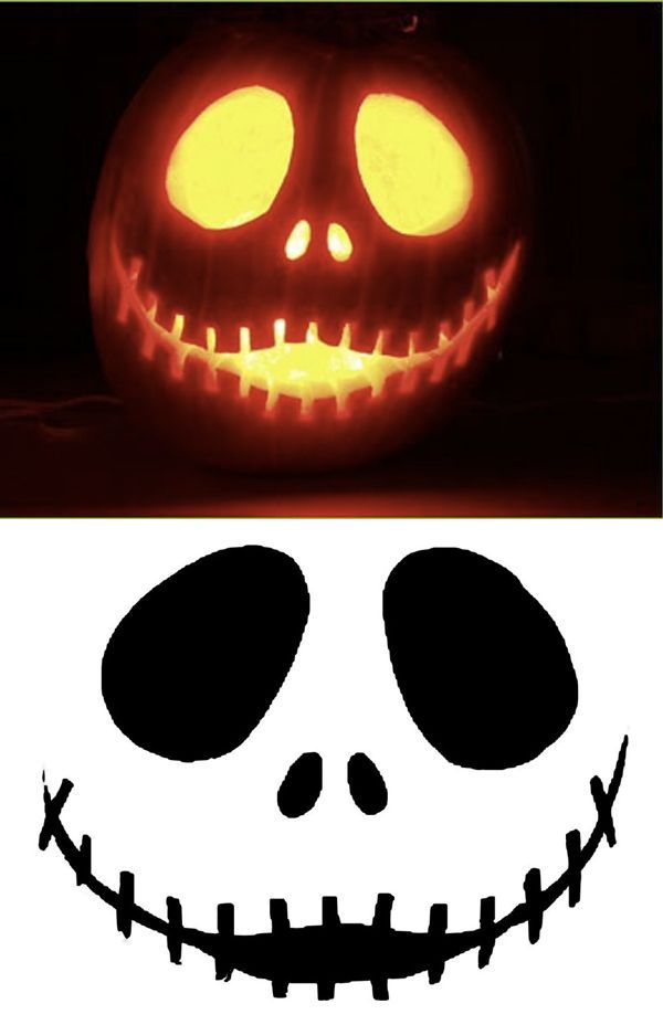 a jack o lantern pumpkin with glowing eyes and an image of the face on it