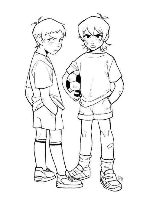 two young boys standing next to each other with their hands on their hipss and holding a soccer ball