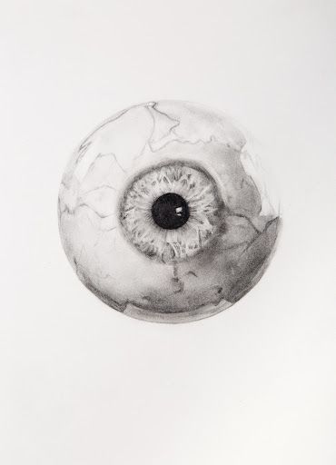 a drawing of an eyeball in black and white