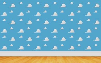 an empty room with blue wallpaper and wooden flooring in front of it is a large group of white clouds