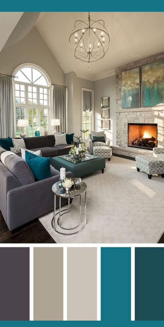 a living room filled with furniture and a fire place in the middle of the room