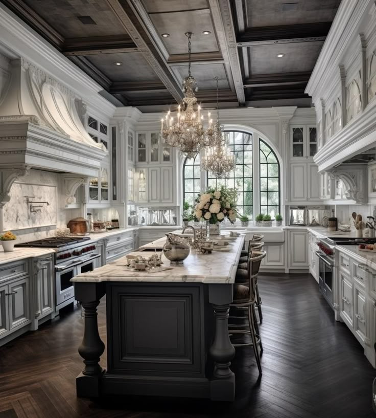 a large kitchen with an island and chandelier