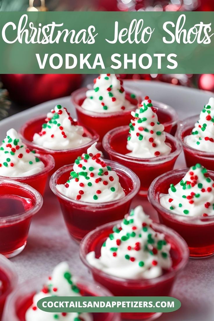 christmas jello shots with white frosting and green sprinkles on top