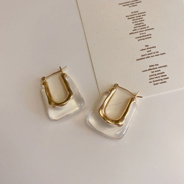 Remy Haley Earrings – Nya Rose Chic Cream Jewelry For Gift, Chic Cream Jewelry For Gifts, Classic Summer Jewelry For Gifts, Trendy Beige Drop Earrings, Chic Beige Dangle Jewelry, Chic Clear Earrings For Gift, Gold Rectangular Jewelry For Summer, Rectangular Gold Jewelry For Summer, Rectangular Gold Summer Jewelry