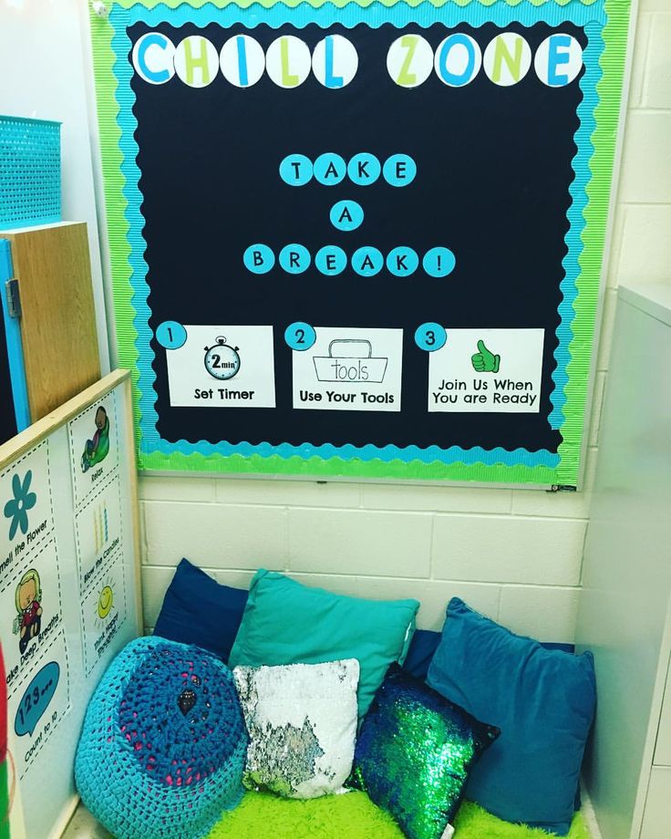 a bulletin board and pillows in a classroom