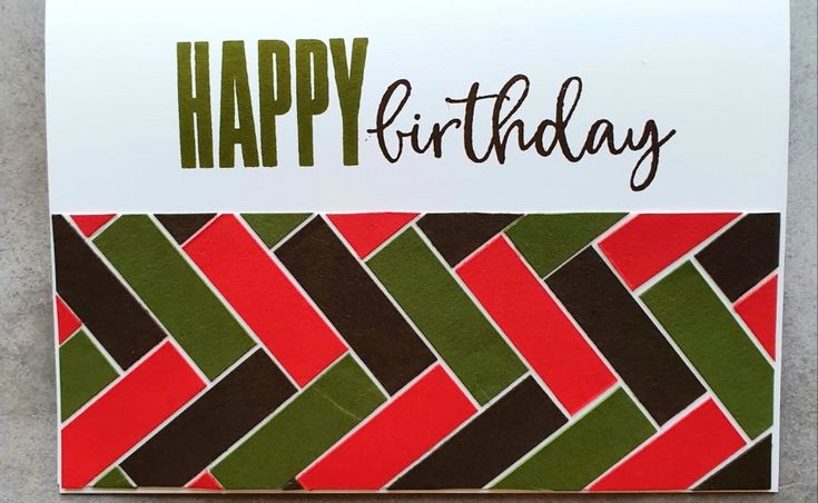 a card with the words happy birthday written on it and an abstract pattern in red, green, brown and white