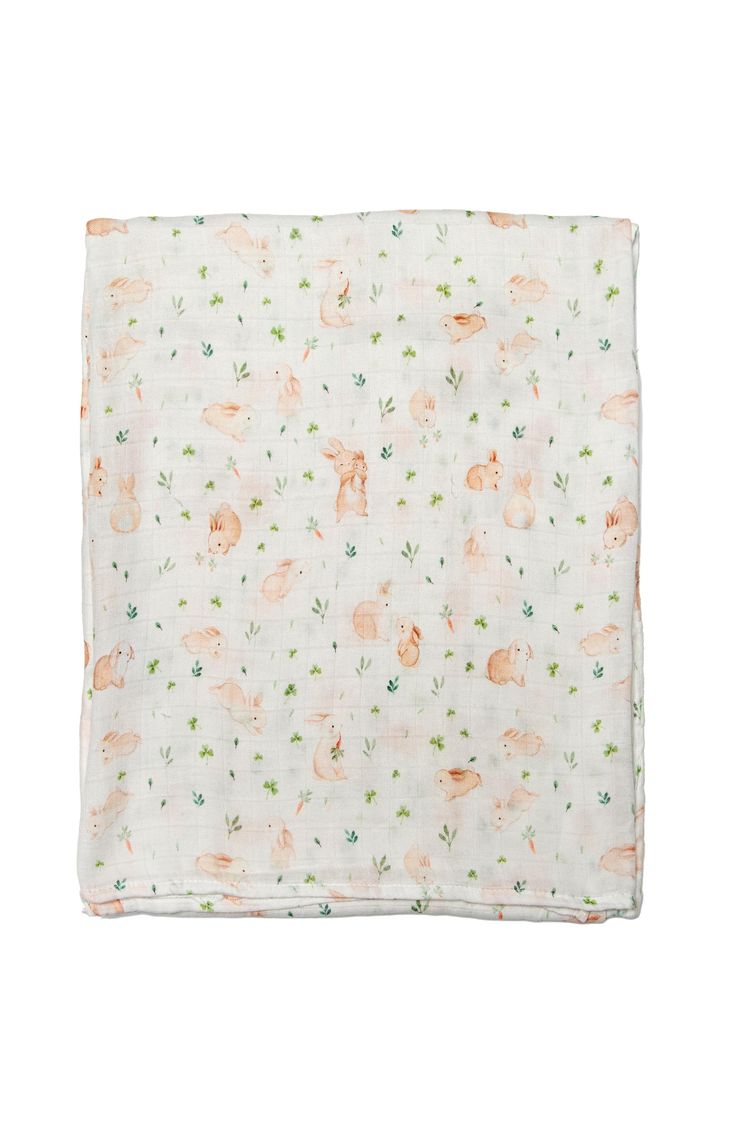 an orange and white floral print pocket square on a white background, with small pink flowers