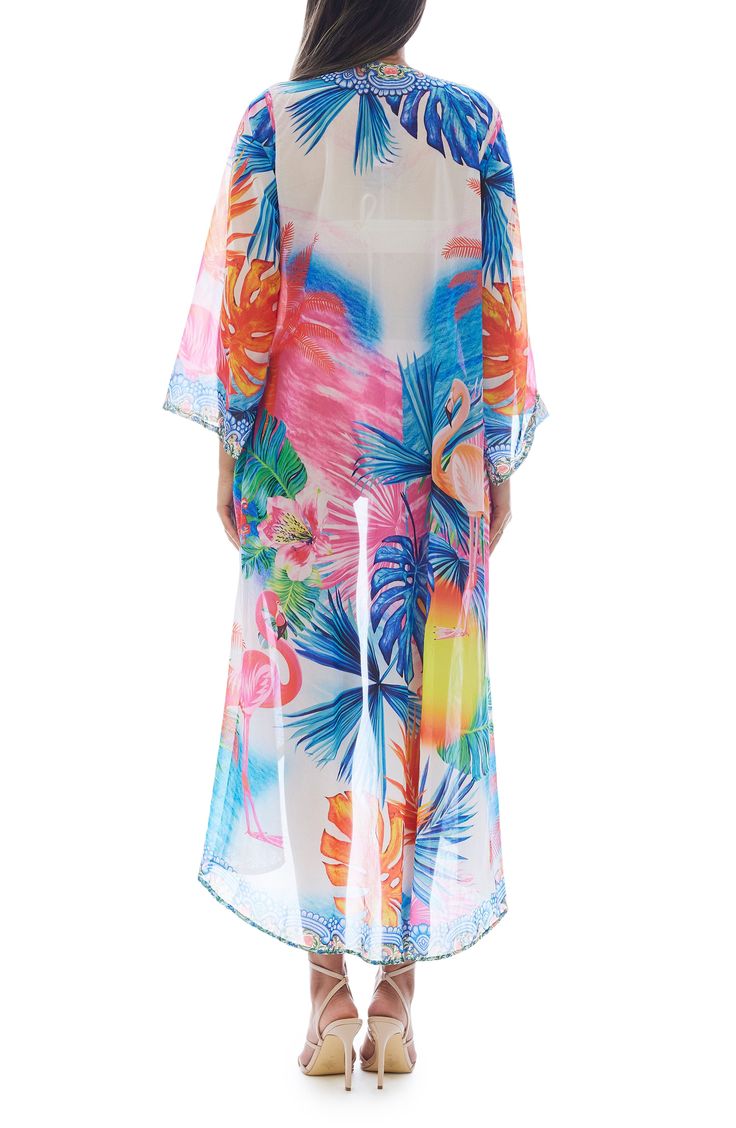 Charm your festival or beach look with this lightweight duster covered in a vibrant flamingo pattern. Open front Kimono-inspired sleeves
 100% polyester
 Hand wash cold, lay flat to dry
 Imported Model stats: 5'10", 32" bust, 25" waist, 36" hip. Model is wearing size One Size. Tropical Long Sleeve Cover-up For Beach Season, Casual Pink Kimono For Beach Season, Tropical Print Kimono For Summer, Summer Tropical Print Kimono, Tropical Kimono With Tropical Print For Summer, Summer Tropical Style Kimono With Tropical Print, Summer Tropical Kimono With Tropical Print, Multicolor Tropical Print Summer Cover-up, Multicolor Beachwear Kimono For Beach Party