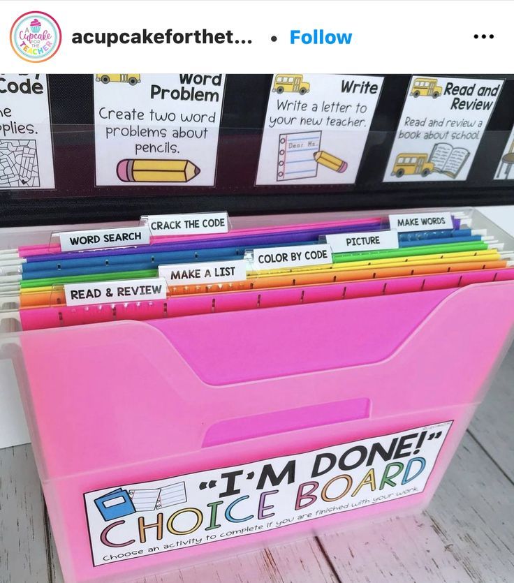 a pink plastic box filled with lots of books