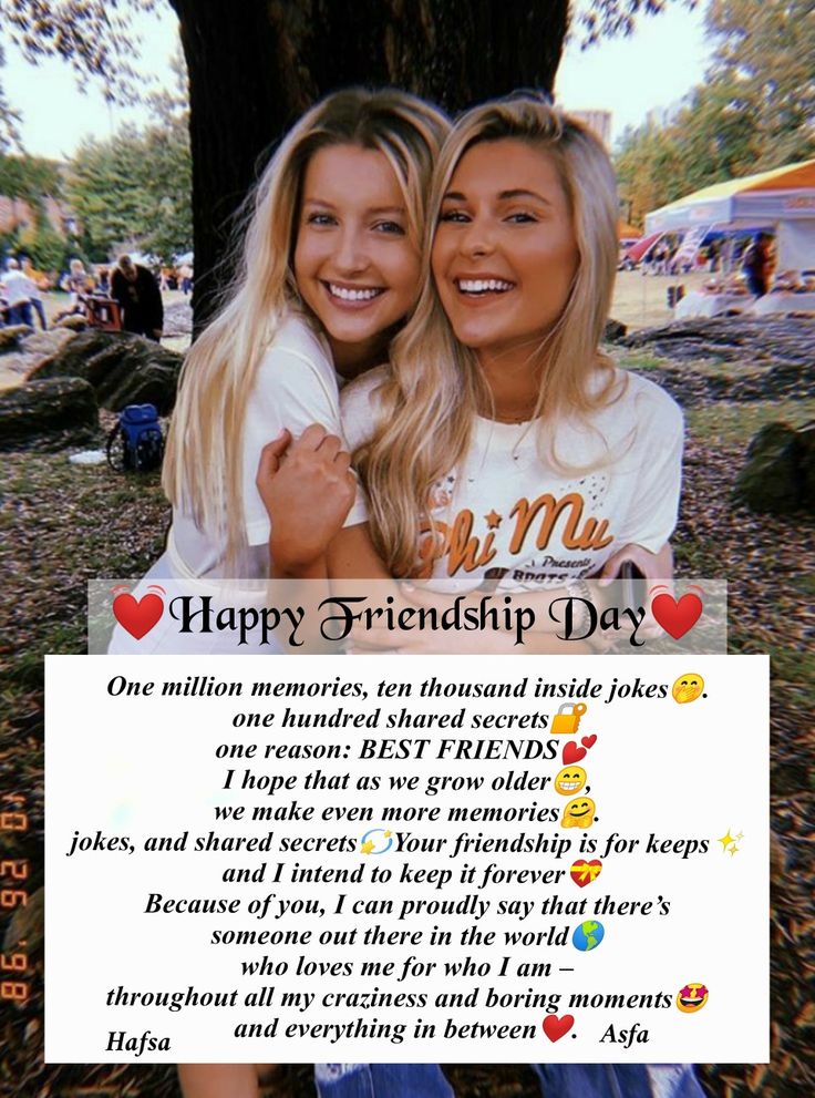 two women are smiling and hugging each other in front of a sign that says happy friends day