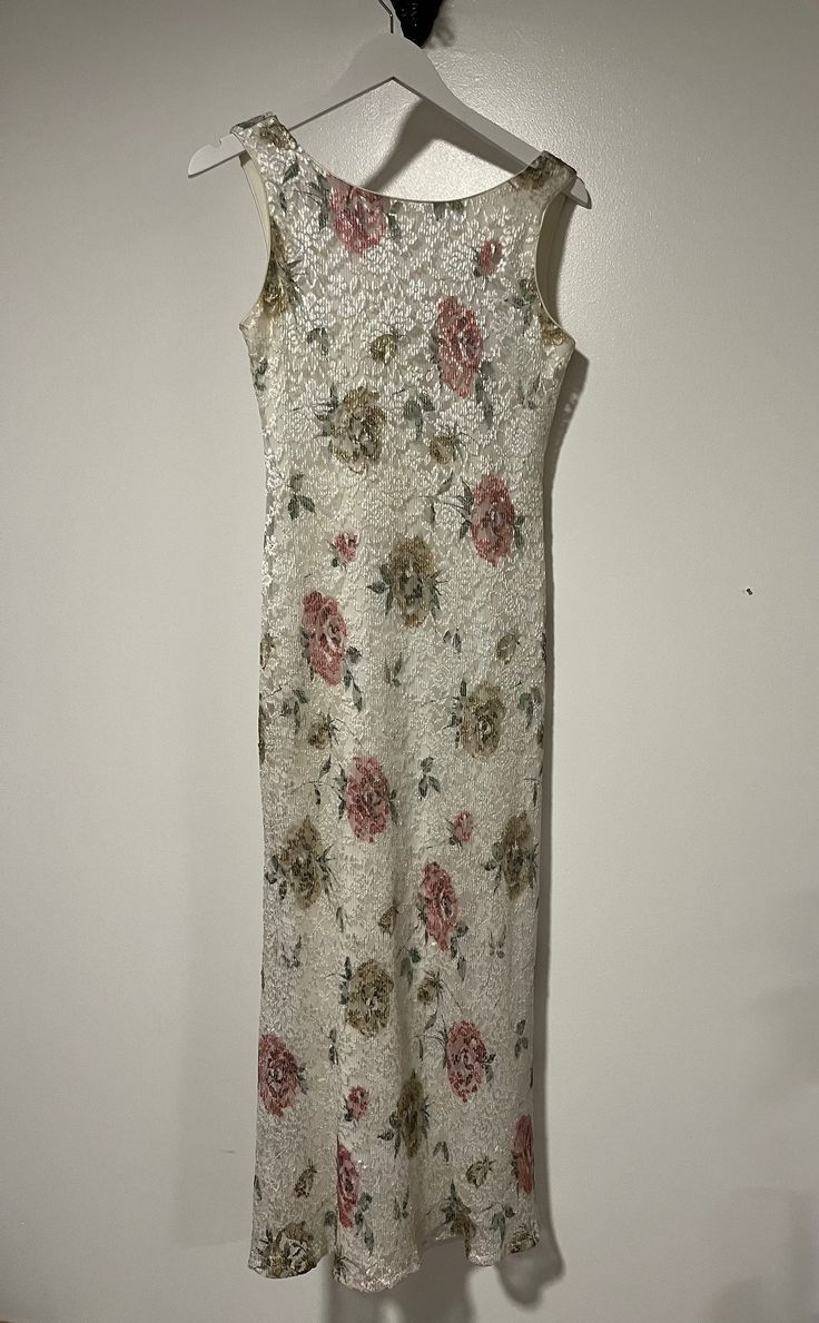 "Beautiful classic floral lace dress  Made in Canada 🍁  💯 % polyester Size 7 please see measurements for sizing Strap to strap 11\" Pit to pit 17\" Length 53\" Waist 16\" Armhole 9\" Vintage item, regular wear due to age should be expected  Returns & exchanges not accepted but please feel free to contact if you have an issue with your item." White Scalloped Lace Sleeveless, Sleeveless White Scalloped Lace, Fitted Floral Print Lace Dress For Wedding, Fitted Floral Lace Dress For Wedding, Fitted Lace Dress With Floral Embroidery, Sleeveless Lace Patchwork For Summer, Elegant Sleeveless Lace For Spring, Fitted White Lace Dress With Floral Embroidery, Spring Fitted Floral Embroidery Lace