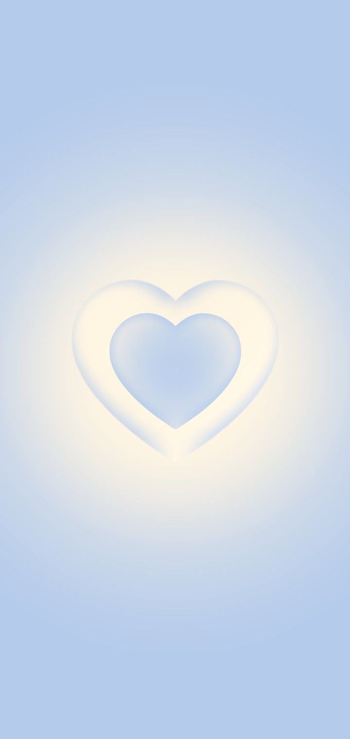 a white heart shaped object floating in the air on a light blue background with clouds