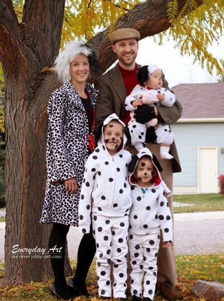 the family is dressed up in dalmatian costumes