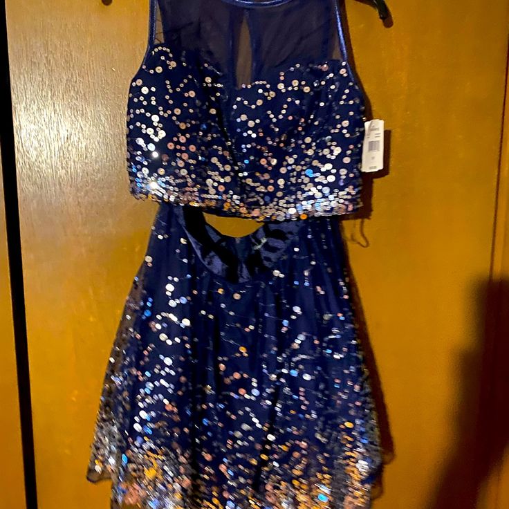 Blue Two Piece Sequin Dress Size 13 Nwt Blue Mini Dress For Prom Season, Blue Sleeveless Mini Dress For Prom, Blue Sleeveless Dress For Party Season, Royal Blue Mini Dress For Homecoming, Blue Prom Season Dresses For Night Out, Blue Dresses For Prom Night Out, Blue Prom Dresses For Night Out, Royal Blue Sequin Dress For Spring, Blue Mini Dress For Homecoming Party Season