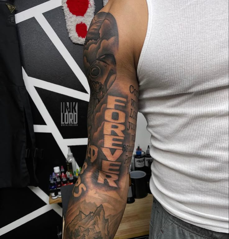 a man with a tattoo on his arm