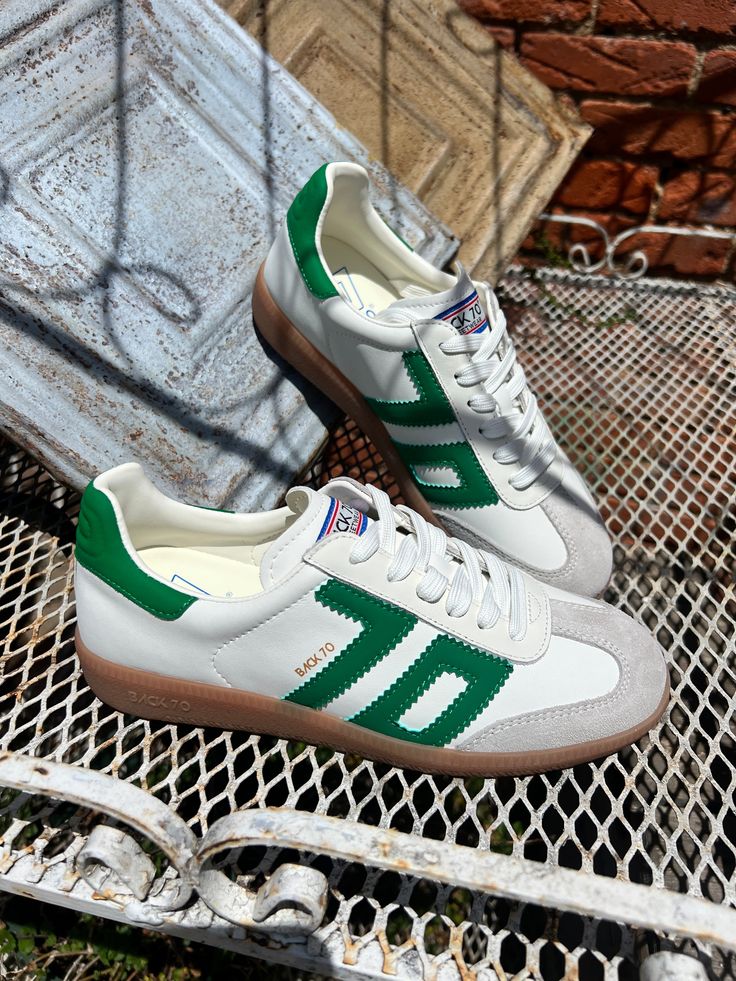 Embrace modern European street style with nostalgic, soccer-inspired sneakers. These statement kicks are scoring big time on the fashion scene with the perfect blend of planned and off-duty vibes. Refresh your streetwear looks with bold color block design, and a fusion of retro cool and modern edge.Features: - Women's sneakers - Stitched details - Easy lace up closure - Luxe streetwear styleMaterials: - Handcrafted leather and suede - Lined with soft fabric and suede - Padded sock - Removable fo Trendy Green Custom Sneakers For Sports, Green High-top Sneakers With Contrast Sole For Light Sports, Green High-top Sneakers For Light Sports With Contrast Sole, Green Casual Sneakers For Light Sports, Sporty Green Custom Sneakers For Light Sports, Trendy Green Skate Shoes With Vulcanized Sole, Green Sporty Skate Shoes With Contrast Sole, Urban Style Green Custom Sneakers With Gum Sole, Green Casual Skate Shoes For Sports