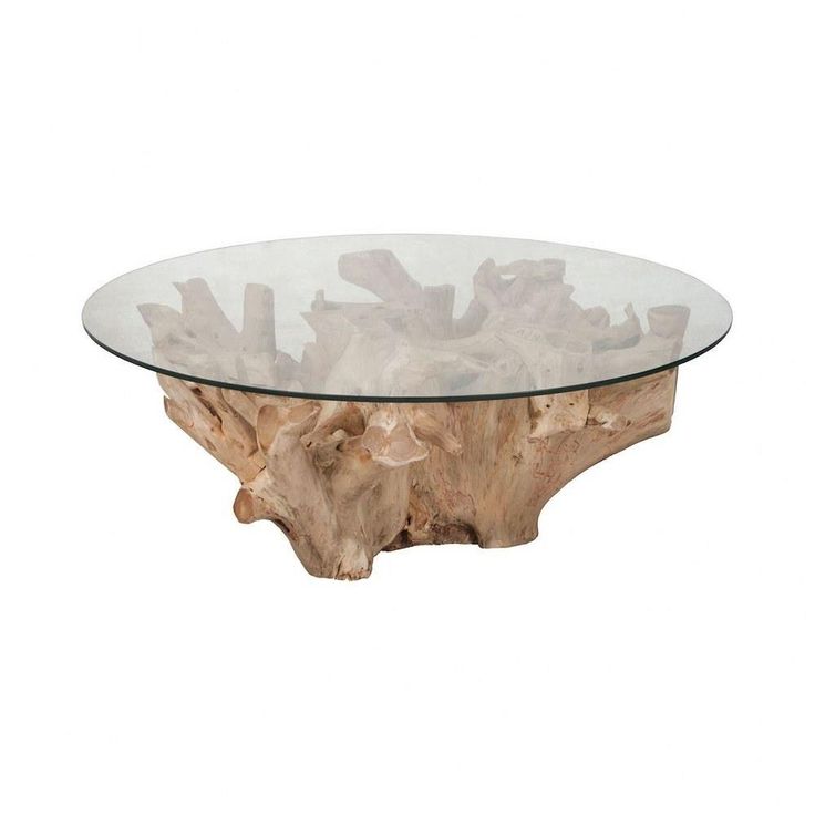 a glass and wood coffee table sitting on top of a white floor