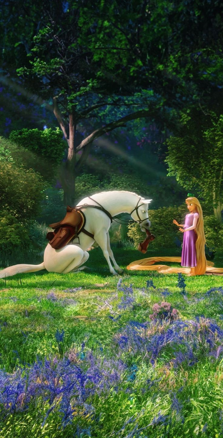 a woman standing next to a white horse on top of a lush green field covered in purple flowers