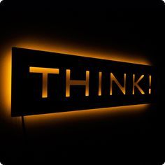 an illuminated sign that says think on it