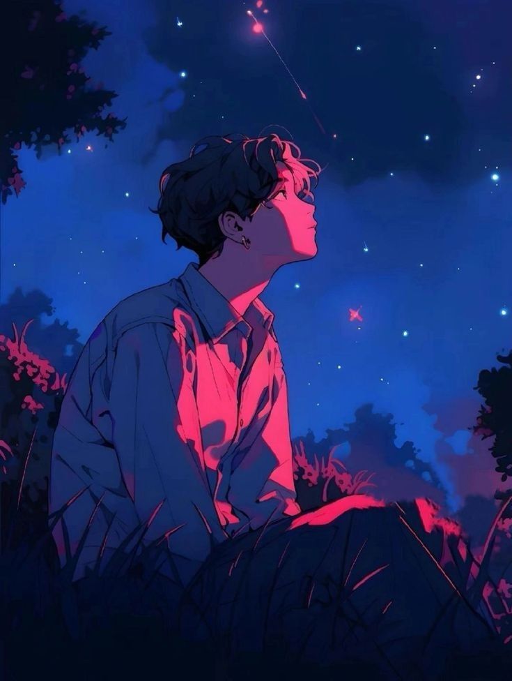 a man sitting in the grass under a night sky with stars above his head, looking up