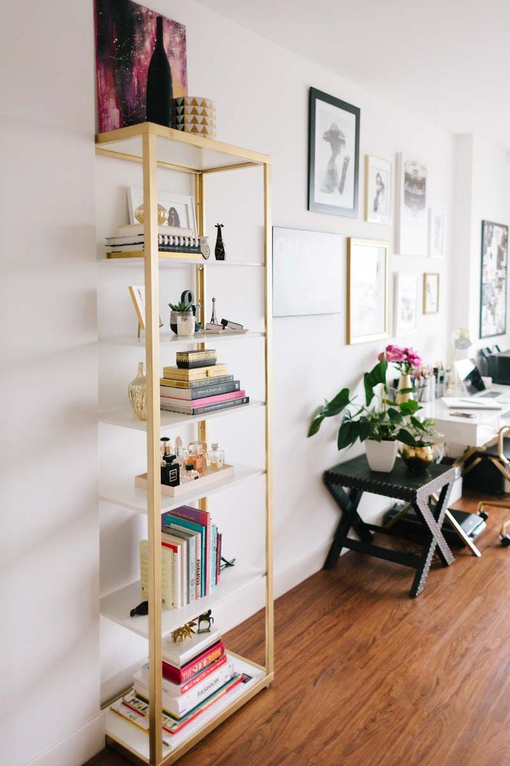 a book shelf with books on top of it