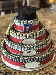 a graduation cake made out of stacks of money