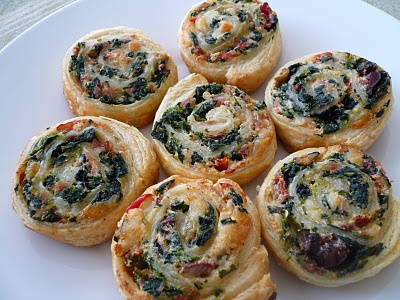 several small pastries on a white plate