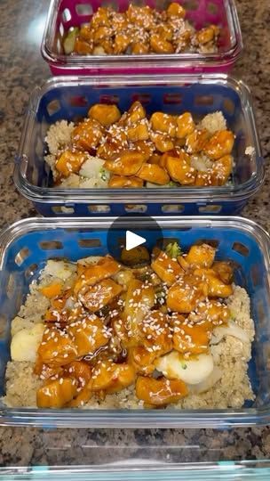 three plastic containers filled with food on top of a counter