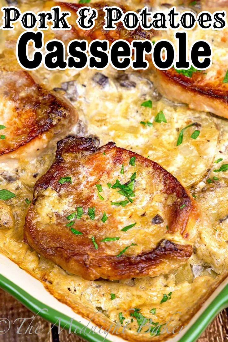 pork and potatoes casserole with parsley on top in a green baking dish